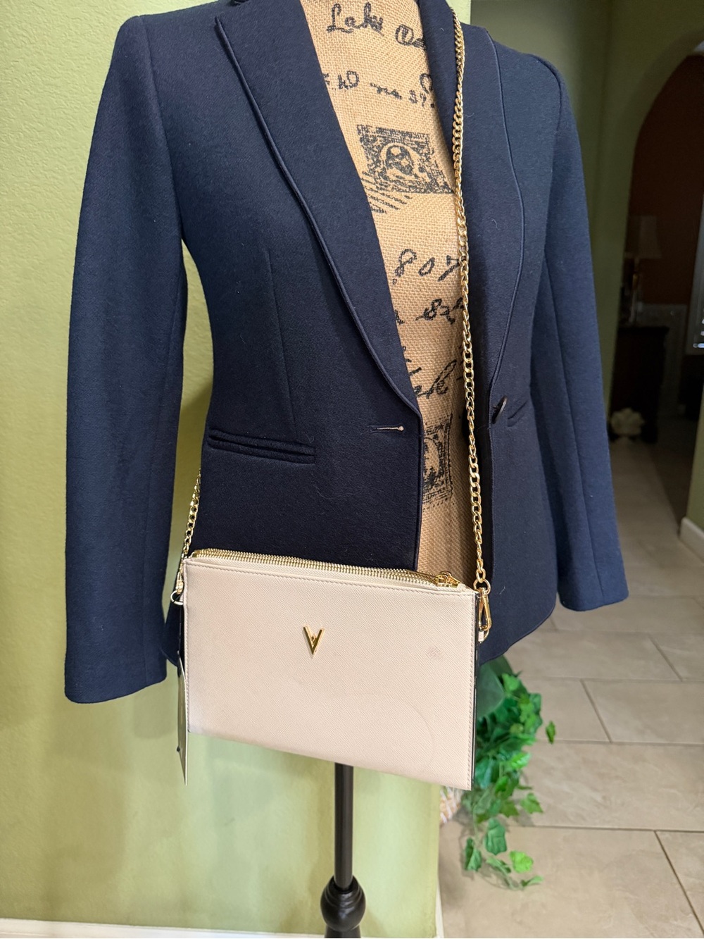 Vanessa Williams Crème Crossbody Bag with Gold Chain and 'V' Accent